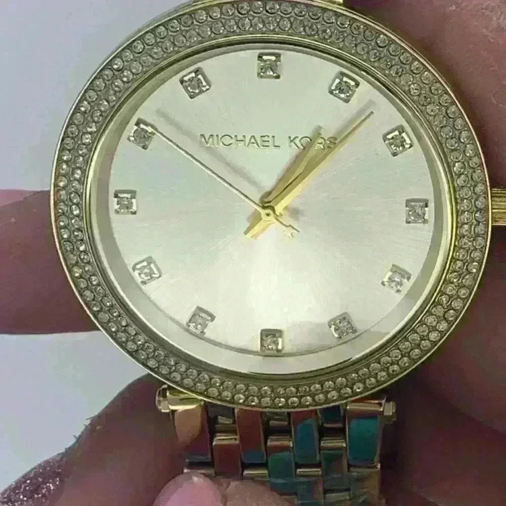 NEW! Michael Kors Gold Watch. Never worn.
